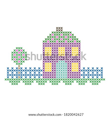 The cross-stitch spring house is isolated on the white background.