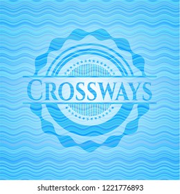 Crossways water representation emblem.