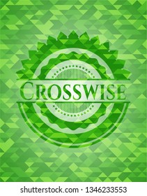 Crosswise green emblem. Mosaic background