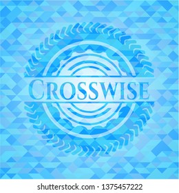 Crosswise sky blue emblem with triangle mosaic background