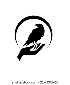 Crow and hand logo. Isolated Crow on white background. Vector illustration