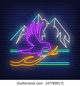 Crow sitting on branch and mountains neon sign. Bird, mystery, Halloween design. Night bright neon sign, colorful billboard, light banner. Vector illustration in neon style.