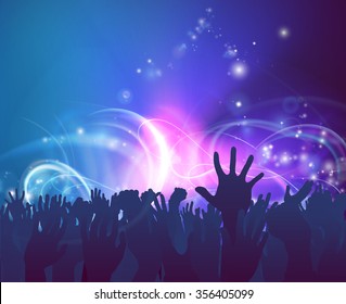 Crowd background of peoples hands up in celebration in silhouette with abstract lights background
