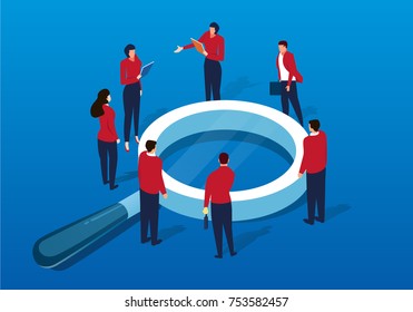 A crowd of people around the magnifying glass