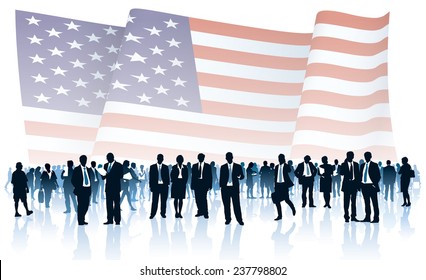 Crowd of people in front of large national US flag