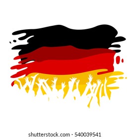 Crowd of people on the german flag in  background