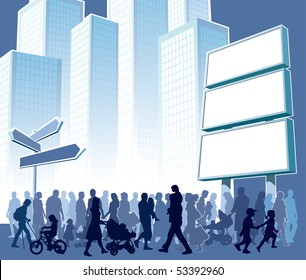 Crowd of people walking on a street.