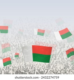 Crowd of people waving flag of Madagascar square graphic for social media and news. Vector illustration.