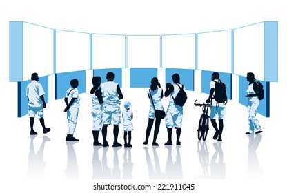 Crowd of spectators looking at display units