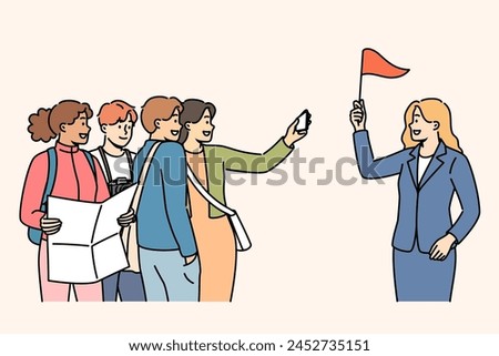 Crowd of tourists follows guide with red flag, telling about sights of city and interesting historical events. Happy tourists participate in group excursion while traveling around world