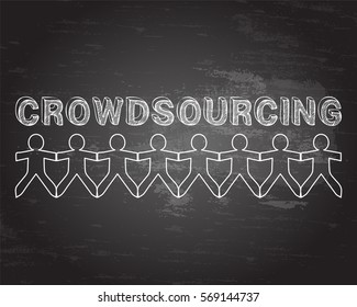 Crowdsourcing hand drawn text and cut out paper people chain on blackboard background