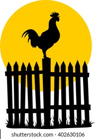 crowing rooster on the background of sunrise