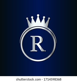 corona con el logotipo de letras circulares