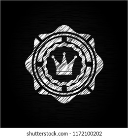 crown icon drawn on a chalkboard