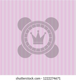crown icon inside badge with pink background