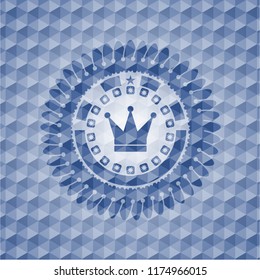 crown icon inside blue emblem or badge with abstract geometric pattern background.