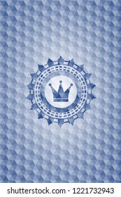 crown icon inside blue emblem or badge with abstract geometric pattern background.