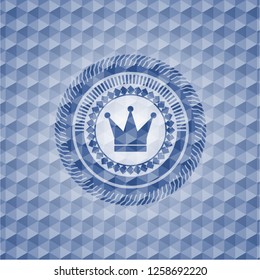 crown icon inside blue polygonal badge.