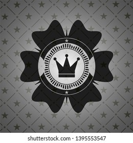 crown icon inside dark emblem