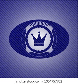 crown icon inside emblem with denim texture