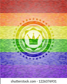 crown icon inside emblem on mosaic background with the colors of the LGBT flag