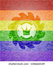 crown icon inside emblem on mosaic background with the colors of the LGBT flag