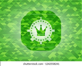 crown icon inside green emblem with mosaic background