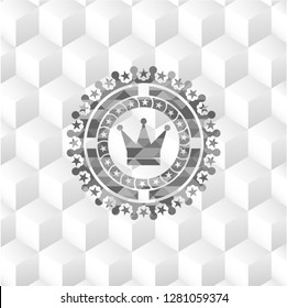 crown icon inside grey badge with geometric cube white background