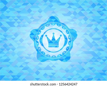 crown icon inside realistic light blue mosaic emblem