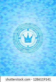 crown icon inside realistic light blue mosaic emblem