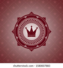 crown icon inside realistic red emblem
