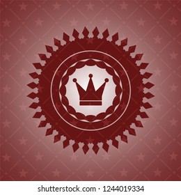 crown icon inside red emblem