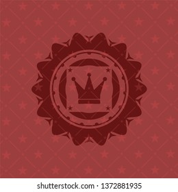 crown icon inside red emblem