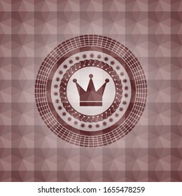 crown icon inside red seamless emblem or badge with geometric pattern background.