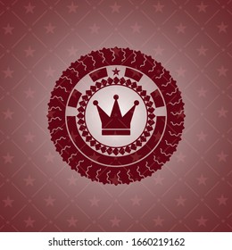 crown icon inside retro red emblem