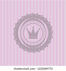 crown icon inside retro style pink emblem