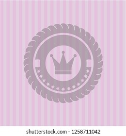 crown icon inside retro style pink emblem