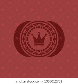 crown icon inside retro style red emblem