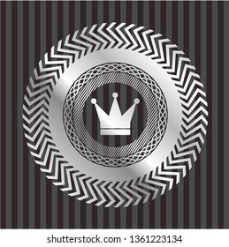 crown icon inside silvery shiny emblem