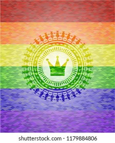 crown icon on mosaic background with the colors of the LGBT flag