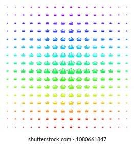 Crown icon spectrum halftone pattern. Vector crown items arranged into halftone grid with vertical rainbow colors gradient. Designed for backgrounds, covers and abstract compositions.