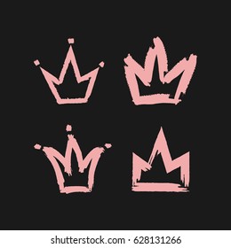 Crown painted and rough brush  Four pink icons isolated black background  Vector illustration  Grunge  