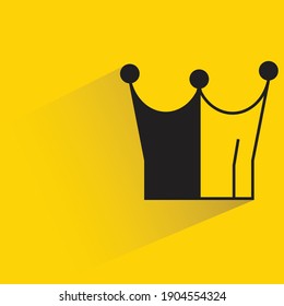 crown with shadow on yellow background