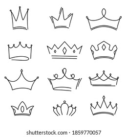 Crowns.Set of crowns for decorative design. Hand-drawn vector sketch. Line art print. banner, background, sketch, illustration. Fashion print. Cartoon vector illustration of crowns. Vector sign.