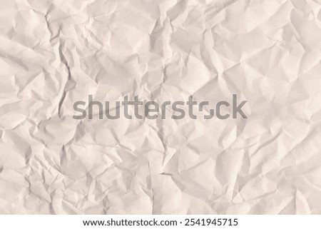 Crumpled brown recycled paper background. Old brown vintage wrinkled paper sheet