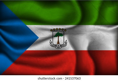 crumpled flag of Equatorial Guinea on a light background.