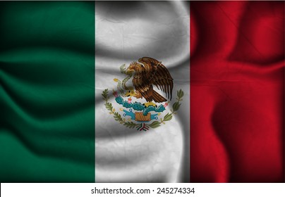crumpled flag of Mexico on a light background.