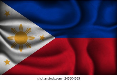 crumpled flag of Philippines on a light background.