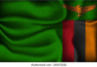 crumpled flag of Zambia on a light background.