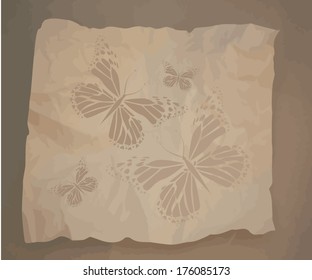Crumpled old sheet with butterflies. Vector